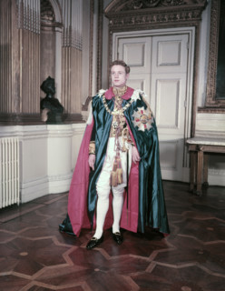 A model wearing the mantle and insignia of the Order of St Michael and St George, c1950s. Creator: Arthur Charles Kirby Ware.