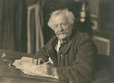 Félix Nadar seated at writing table, 1905-1910. Creator: Nadar.