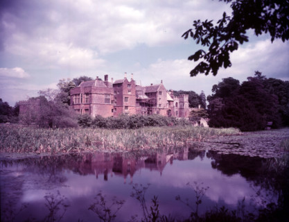 Broughton Castle and moat, Oxfordshire, c1955. [gateway, church] Creator: Arthur Charles Kirby Ware.