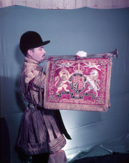 State trumpeter with 'ER' cypher on banner, side view, London, c1953. Creator: Arthur Charles Kirby Ware.