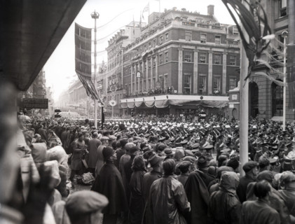 Crowds watching the coronation procession of Queen Elizabeth II, Oxford Street, London, 2 June 1953. Creator: Arthur Charles Kirby Ware.