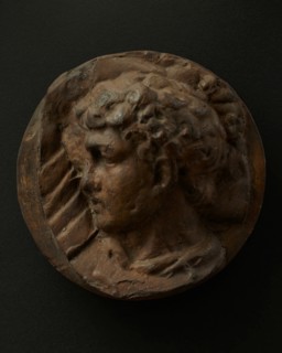 Cast of left profile of legionary with hammer in hand. Creator: Unknown.