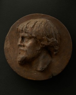 Cast of left profile of Dacian man with full hair and beard. Creator: Unknown.