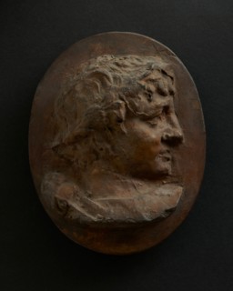Cast of head of young Roman wearing wreath. Creator: Unknown.