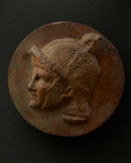 Cast of head of young Roman auxiliary wearing helmet. Creator: Unknown.