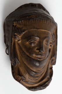 Cast of head of a woman wearing a veil, from Lichfield Cathedral?. Creator: Unknown.