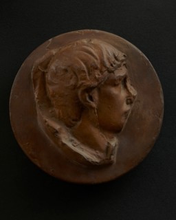 Cast of head of youth in background. Creator: Unknown.
