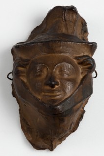 Brown painted plaster cast of head with head-dress, c1850. Creator: Unknown.