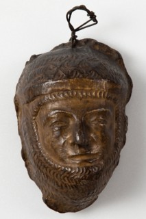 Brown painted plaster cast of male figure in armour or chain mail, c1850. Creator: Unknown.