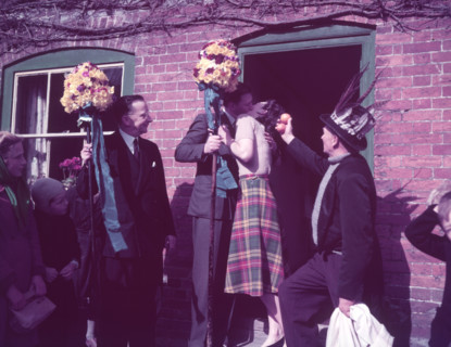 Tutti Men claiming a kiss, Hocktide Festival, Hungerford, Berkshire, c1955. Creator: Arthur Charles Kirby Ware.