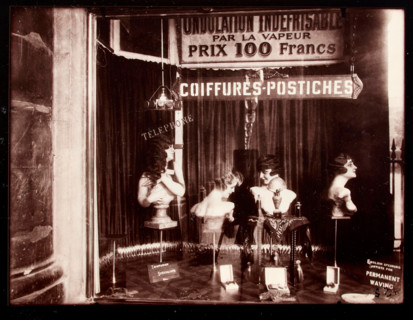 Coiffeur, Palais Royal, 1926-1927. Creator: Eugene Atget.