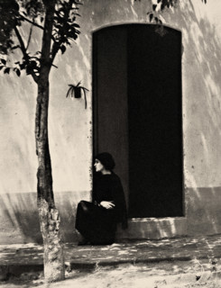 Tina at the door, 1923. Creator: Tina Modotti.