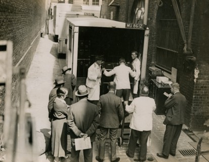 Zheng Tianxin (Dr Cheng) with vans and staff from Bishop & Sons Depositories...Burlington House,1935 Creator: Topical Press Agency.