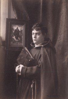 Photograph of a young man, wearing monastic robes, Taormina, Sicily, c1890s. Creator: Count Wilhelm von Gloeden.
