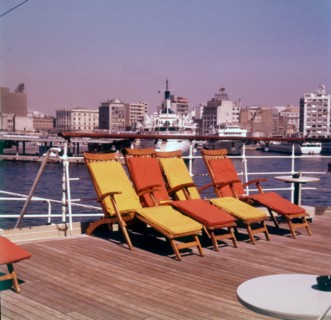 Sun loungers on the deck of a ship at the port of Piraeus, Athens, Greece, c1955. Creator: Arthur Charles Kirby Ware.
