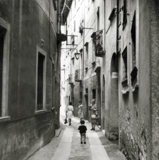 Narrow street in Orta San Giulio, Lake Orta, Italy, c1955.  Creator: Arthur Charles Kirby Ware.