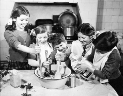 Children cooking at Christmas, c1955. Creator: Arthur Charles Kirby Ware.