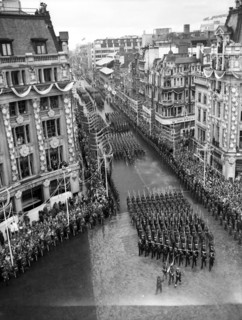 Crowds watching the coronation procession of Queen Elizabeth II, Oxford Circus, London, 2 June 1953. Creator: Arthur Charles Kirby Ware.