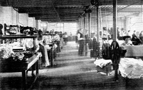 The smoothing, finishing, and making-up room, Jones Brothers' handkerchief factory, Belfast, 1909.  Creator: Unknown.