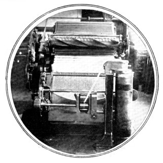 Carding, which transforms the lap into an untwisted strand, known as a sliver, 1909.  Creator: Unknown.