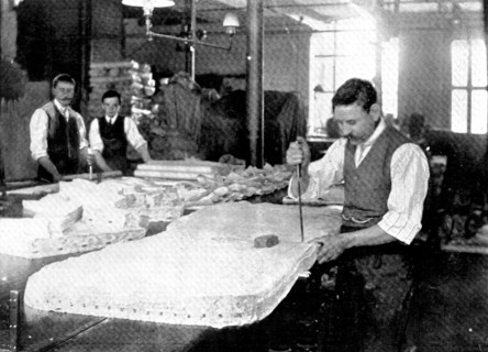 Sixty at a blow: cutting flannel shirts, 1909. Creator: Unknown.