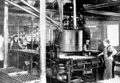 Fourteen thousand tins an hour! A machine that fills tins of "shoeshine", 1909. Creator: Unknown.