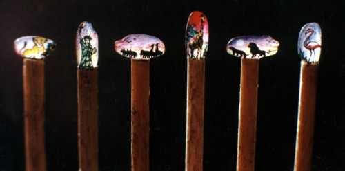 Engraving and painting on a Grain of Rice