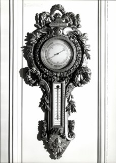 Barometer in sculpted wood