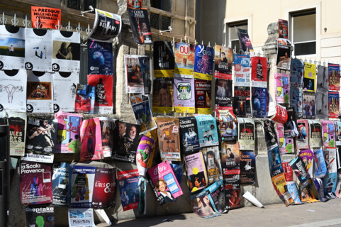 Avignon, grid covered with theatre posters