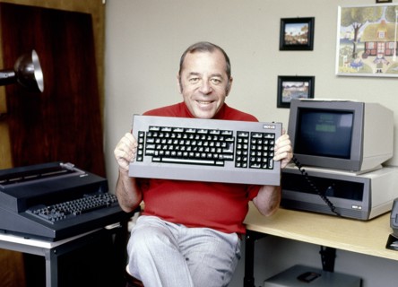 Chris HOWLAND with computer keyboard, undated