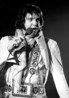 Elvis PRESLEY during a concert, 1977