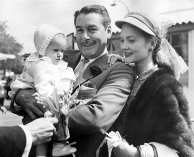 Errol FLYNN with wife Patrice WYMORE and daughter Armelia, 1954