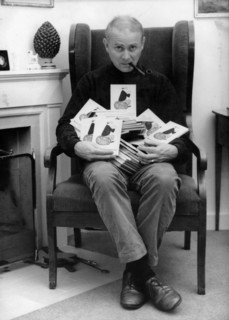 LORIOT with a stack of Loriot books, 1966