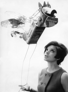 Uschi GLAS with mobile made of cans, Berlin 1967