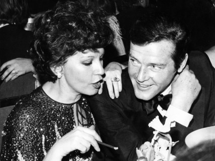 Roger MOORE with his wife Luisa MATTIOLI, Filmball Munich 1977
