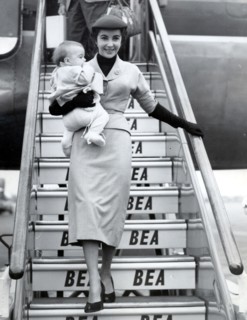 Elizabeth TAYLOR gets off the plane with her son