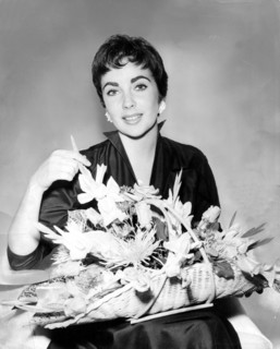Elizabeth TAYLOR with basket of flowers