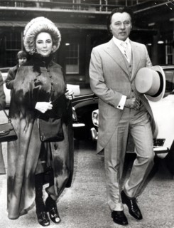 Elizabeth TAYLOR with Richard BURTON leaving Buckingham Palace