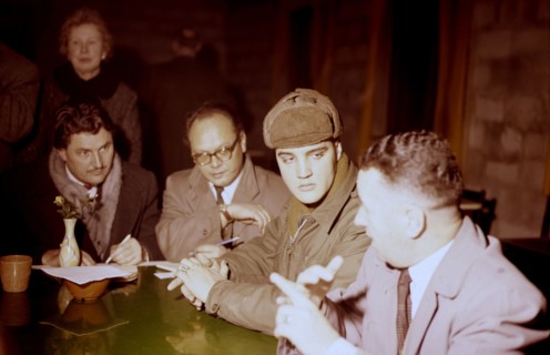 Elvis PRESLEY as a soldier during a press conference, 1958