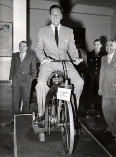 Errol FLYNN on a Daimler two-wheeler from 1885