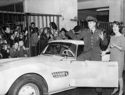 Elvis PRESLEY with a new BMW sports car, Frankfurt 1958