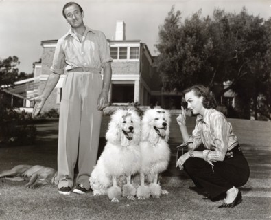 David NIVEN and wife Hjordis with dogs