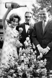 Romy SCHNEIDER waters roses with champagne
