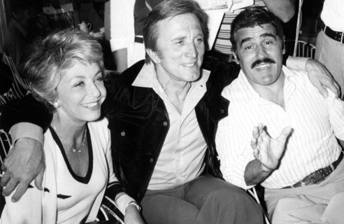 Kirk DOUGLAS with wife Anne and Mario ADORF, 1975