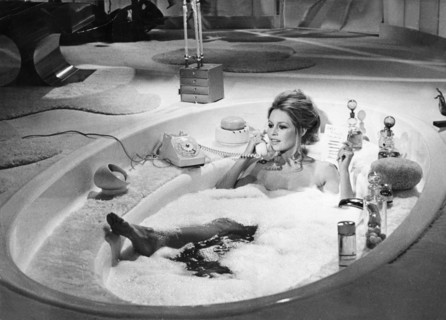 Brigitte BARDOT, talking on the phone in a bathtub
