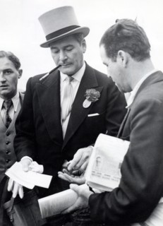 Errol FLYNN at a derby in Epsom, 1954