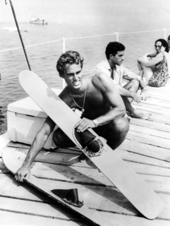 Sean FLYNN with water skis, undated