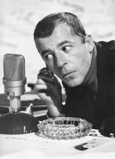 Chris HOWLAND with microphone, undated