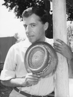 Chris HOWLAND, portrait with hat undated