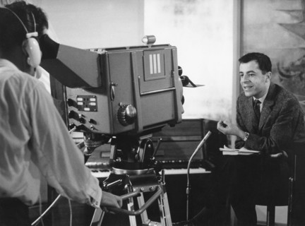 Chris HOWLAND in front of a television camera, undated